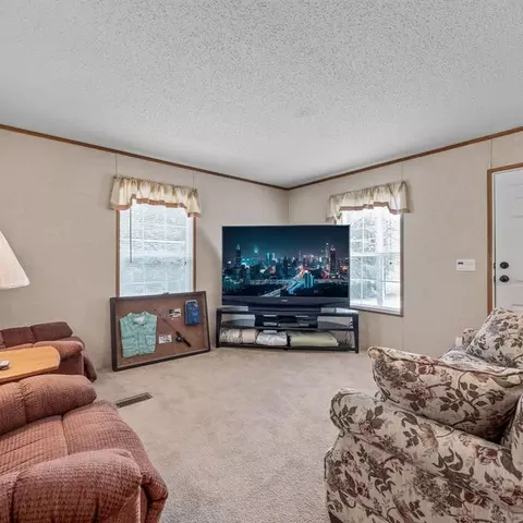Living - 8143 Pine Ridge Rd, Camden, MI 49232 photo 1 of 2