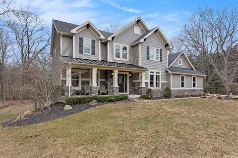 Exterior - 1419 Conservancy Ct NE, Ada, MI 49301 photo 3 of 15