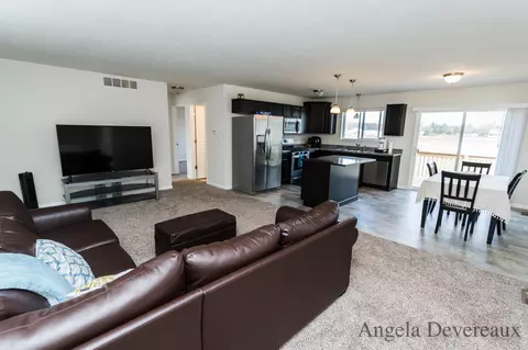 Living - 13815 E Harmony Ct, Sparta, MI 49345 photo 2 of 7