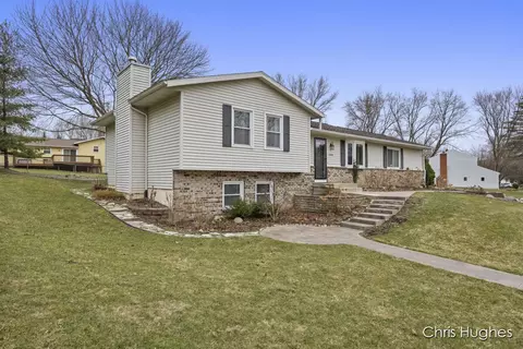Exterior - 6350 Dunbarton St SE, Ada, MI 49301 photo 2 of 9