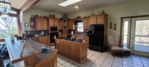 Kitchen - 7190 W Fox Rd, Mears, MI 49436 photo 2 of 4