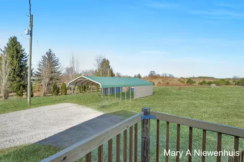 Exterior - 1564 Grow Rd NW, Stanton, MI 48888 photo 4 of 6