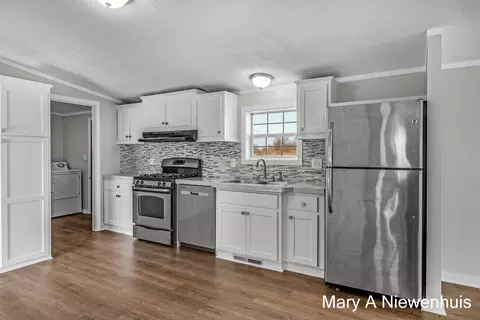 Kitchen - 1564 Grow Rd NW, Stanton, MI 48888 photo 3 of 4