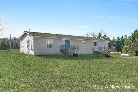 Exterior - 1564 Grow Rd NW, Stanton, MI 48888 photo 3 of 6