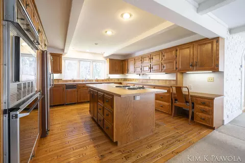 Kitchen - 7675 Timber Bluff Rd SE, Ada, MI 49301 photo 2 of 3