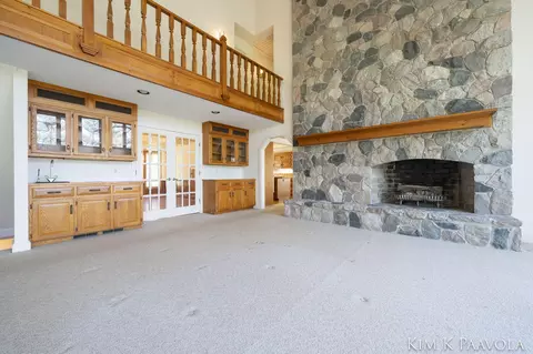 Living - 7675 Timber Bluff Rd SE, Ada, MI 49301 photo 3 of 10