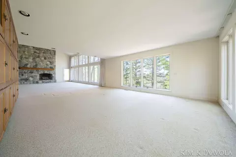 Living - 7675 Timber Bluff Rd SE, Ada, MI 49301 photo 5 of 10