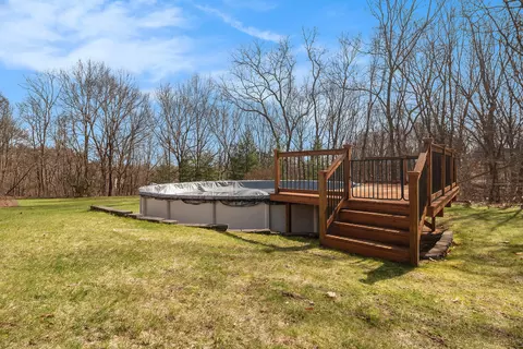Exterior - 13044 Ryan Ridge Dr SE, Lowell, MI 49331 photo 7 of 10
