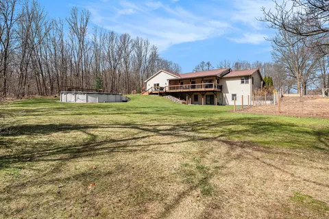 Exterior - 13044 Ryan Ridge Dr SE, Lowell, MI 49331 photo 3 of 10