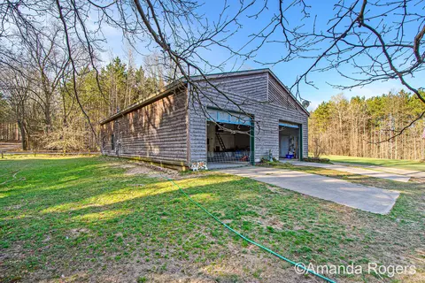 Exterior - 9888 Marble Pines Dr, Lowell, MI 49331 photo 3 of 10