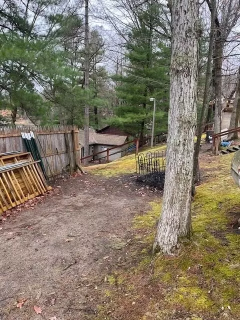 Exterior - 1003 Lake Dr, Harrison, MI 48625 photo 12 of 14