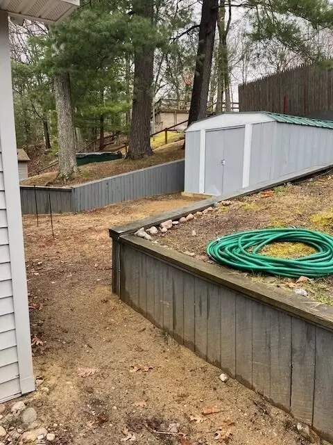 Exterior - 1003 Lake Dr, Harrison, MI 48625 photo 9 of 14