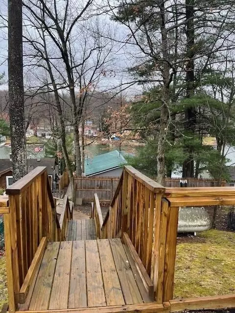 Exterior - 1003 Lake Dr, Harrison, MI 48625 photo 2 of 14