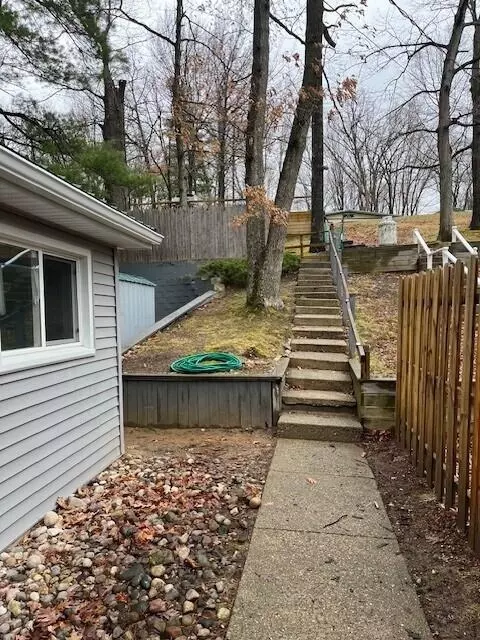 Exterior - 1003 Lake Dr, Harrison, MI 48625 photo 7 of 14