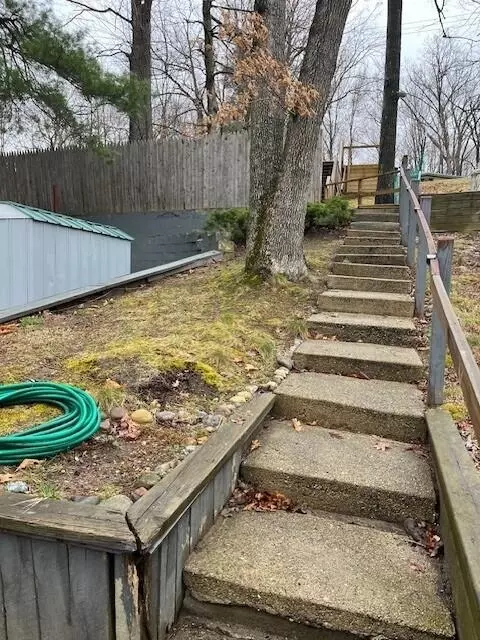 Exterior - 1003 Lake Dr, Harrison, MI 48625 photo 10 of 14