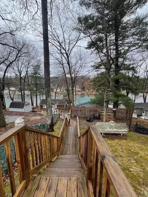 Exterior - 1003 Lake Dr, Harrison, MI 48625 photo 3 of 14