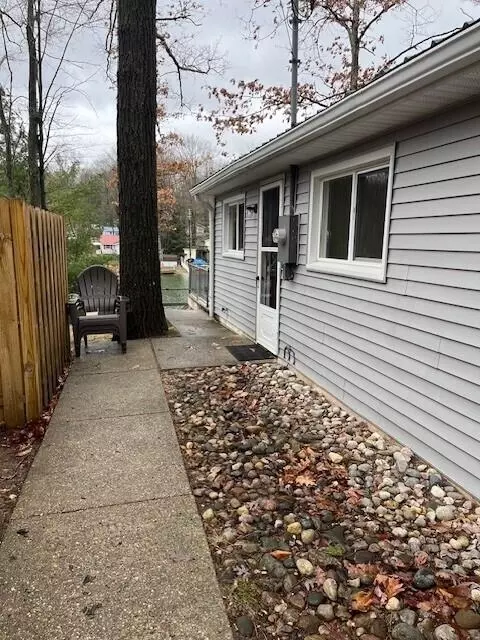 Exterior - 1003 Lake Dr, Harrison, MI 48625 photo 8 of 14