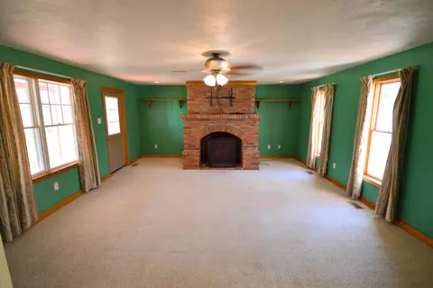 Living - 6506 W Fox Rd, Mears, MI 49436 photo 1 of 2