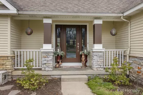 Exterior - 8937 Conservancy Dr NE, Ada, MI 49301 photo 8 of 17