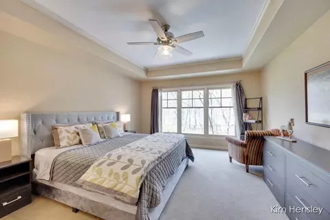 Bedroom - 8937 Conservancy Dr NE, Ada, MI 49301 photo 1 of 11