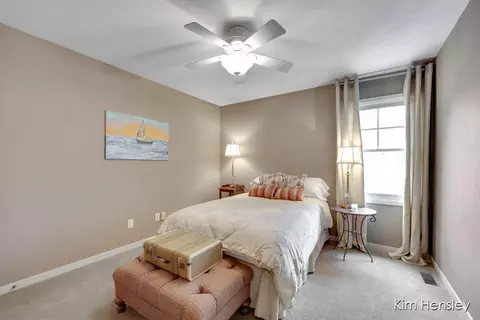Bedroom - 8937 Conservancy Dr NE, Ada, MI 49301 photo 3 of 11