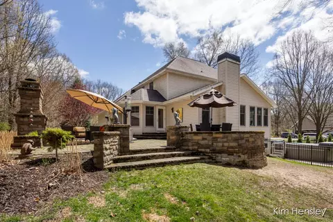 Exterior - 8937 Conservancy Dr NE, Ada, MI 49301 photo 13 of 17