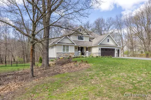 Exterior - 8937 Conservancy Dr NE, Ada, MI 49301 photo 5 of 17