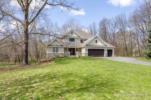 Exterior - 8937 Conservancy Dr NE, Ada, MI 49301 photo 6 of 17