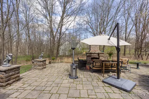 Exterior - 8937 Conservancy Dr NE, Ada, MI 49301 photo 11 of 17