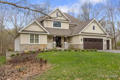 Exterior - 8937 Conservancy Dr NE, Ada, MI 49301 photo 4 of 17