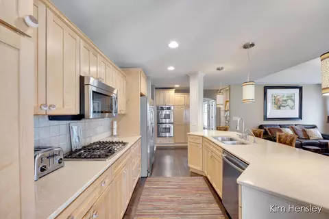Kitchen - 8937 Conservancy Dr NE, Ada, MI 49301 photo 2 of 5