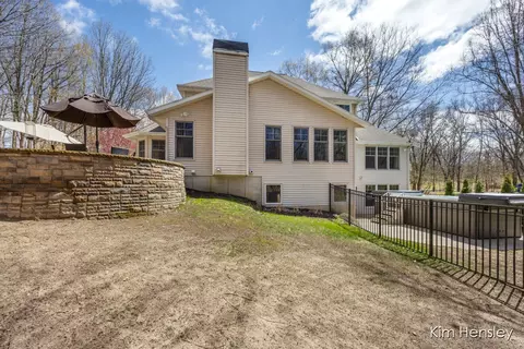 Exterior - 8937 Conservancy Dr NE, Ada, MI 49301 photo 14 of 17