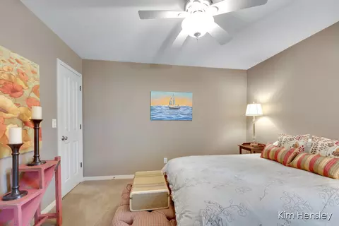 Bedroom - 8937 Conservancy Dr NE, Ada, MI 49301 photo 4 of 11