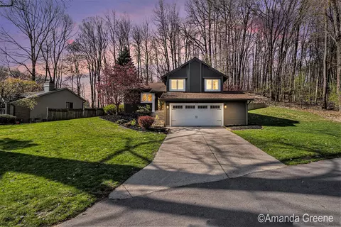 6030 Huntington Dr SE, Ada, MI 49301