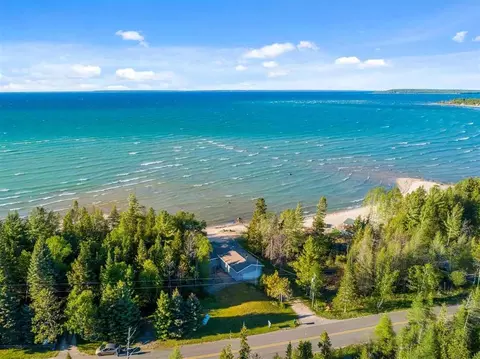 3739 Pointe Dr, Carp Lake, MI 49718