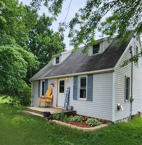 6583 W Tupper Lake Rd, Lake Odessa, MI 48849