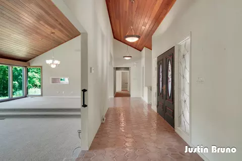 Entry Way - 650 Greentree Ln NE, Ada, MI 49301 photo 2 of 5