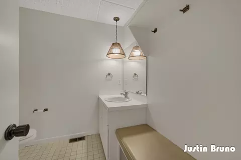 Bath - 650 Greentree Ln NE, Ada, MI 49301 photo 8 of 8