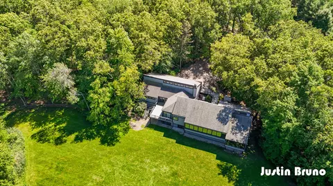 Exterior - 650 Greentree Ln NE, Ada, MI 49301 photo 12 of 14