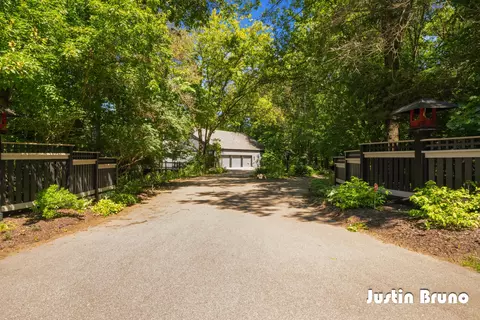 Exterior - 650 Greentree Ln NE, Ada, MI 49301 photo 13 of 14