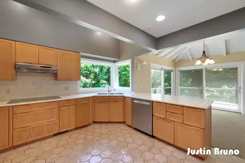 Kitchen - 650 Greentree Ln NE, Ada, MI 49301 photo 3 of 4