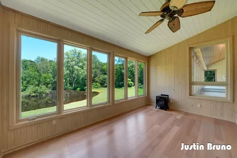 Exterior - 650 Greentree Ln NE, Ada, MI 49301 photo 7 of 14