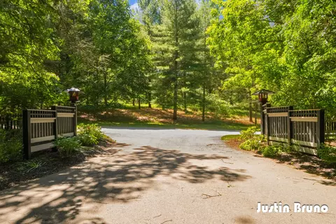 Exterior - 650 Greentree Ln NE, Ada, MI 49301 photo 11 of 14