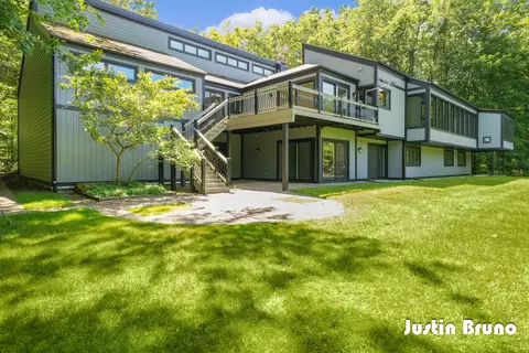 Exterior - 650 Greentree Ln NE, Ada, MI 49301 photo 8 of 14