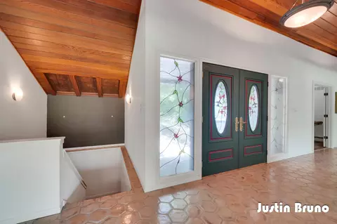 Entry Way - 650 Greentree Ln NE, Ada, MI 49301 photo 1 of 5