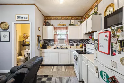 Kitchen - 216 Sunset Blvd, Crystal, MI 48818 photo 6 of 7