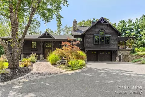 5501 Canyon River Dr NE, Ada, MI 49301