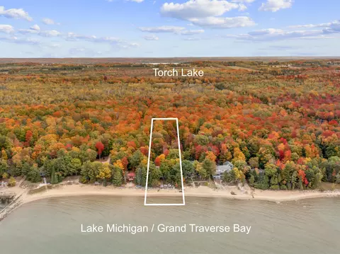 820 S Golden Beach Dr, Kewadin, MI 49648