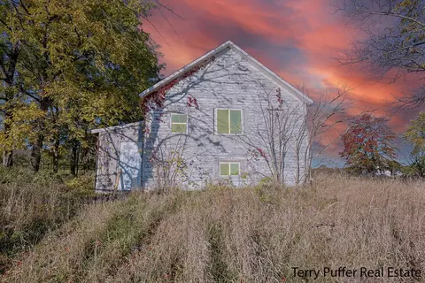 703 Peters Rd, Casnovia, MI 49318