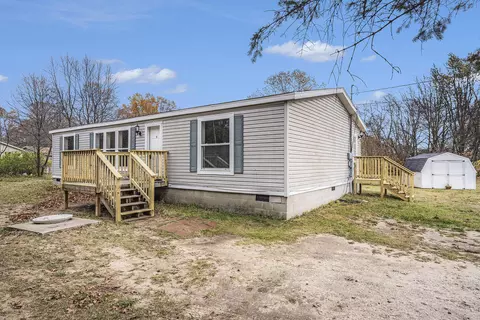 7034 S Surf Ct, Rothbury, MI 49452
